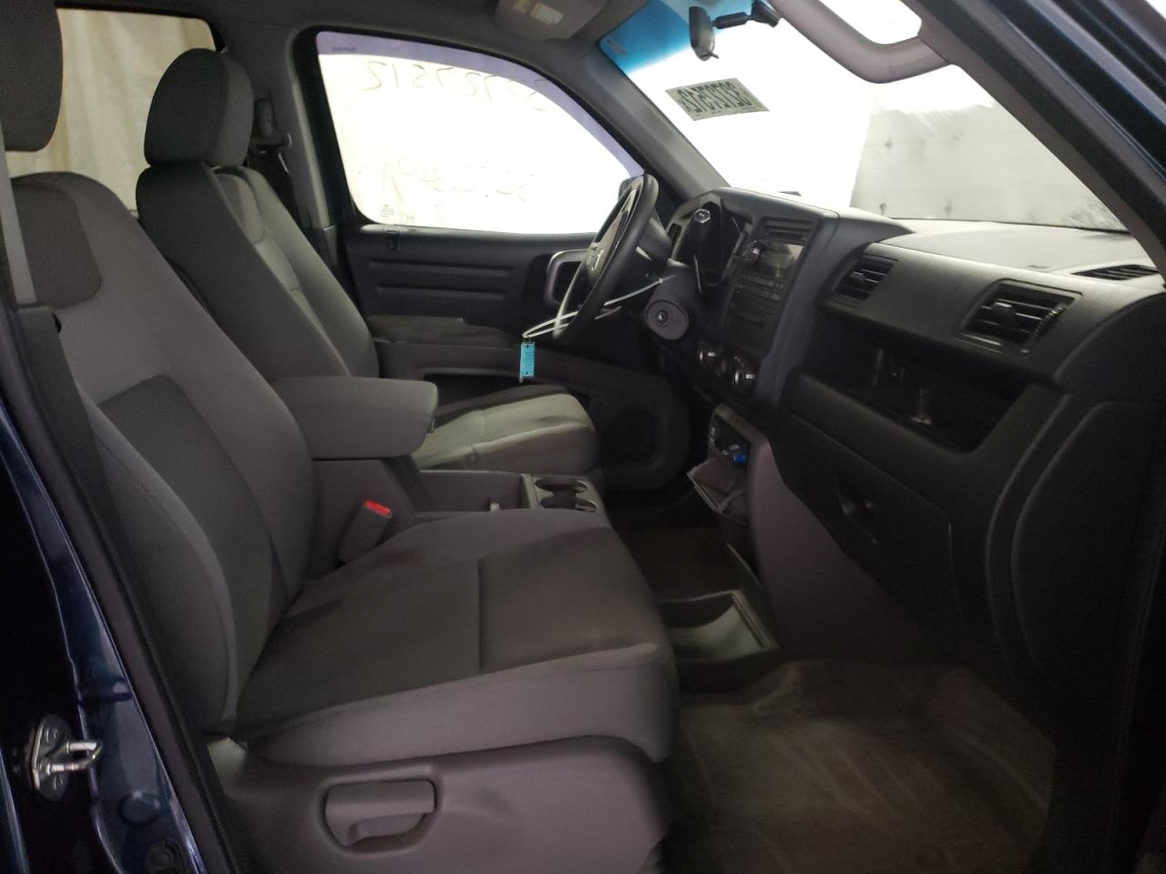 Photo 5 from auction – 2011 HONDA RIDGELINE with VIN 5FPYK1F40BB451230