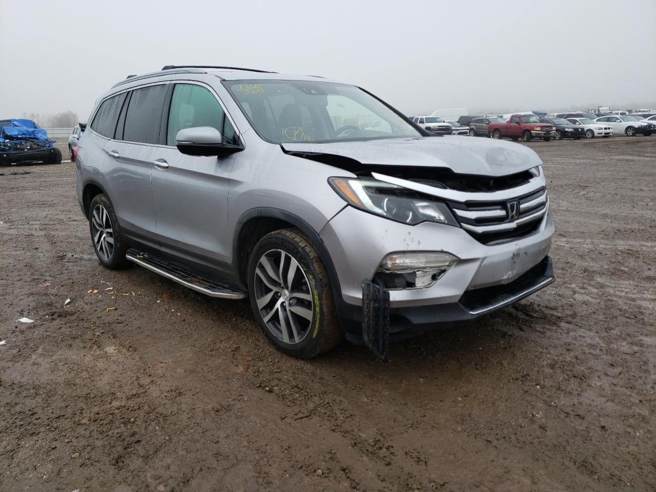 HONDA PILOT ELIT 2016 with VIN 5FNYF6H00GB078217 - Photo from auction