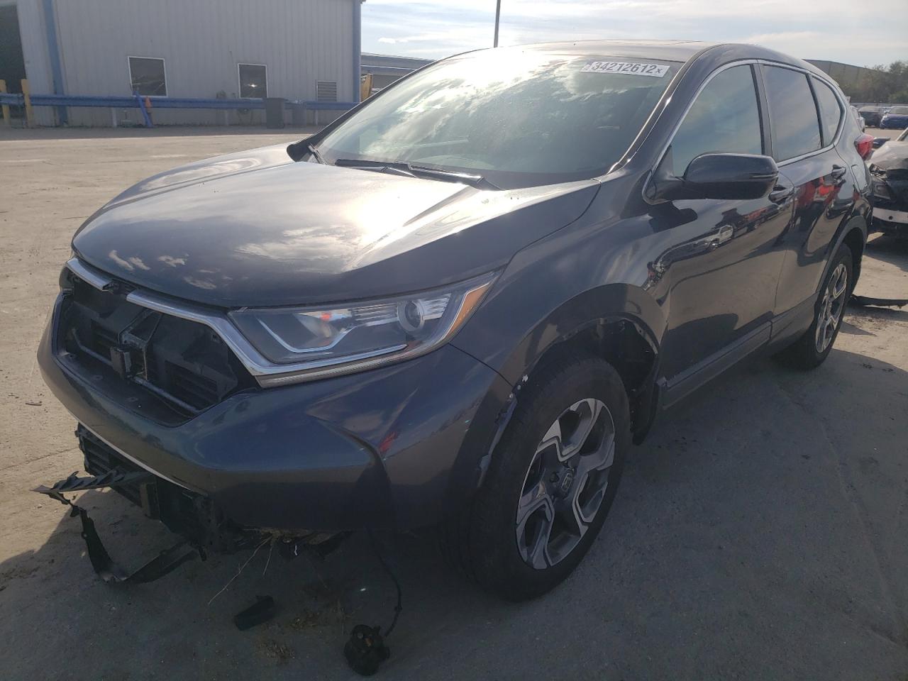 Photo 2 from auction – 2017 HONDA CR-V EX with VIN 7FARW1H57HE047880