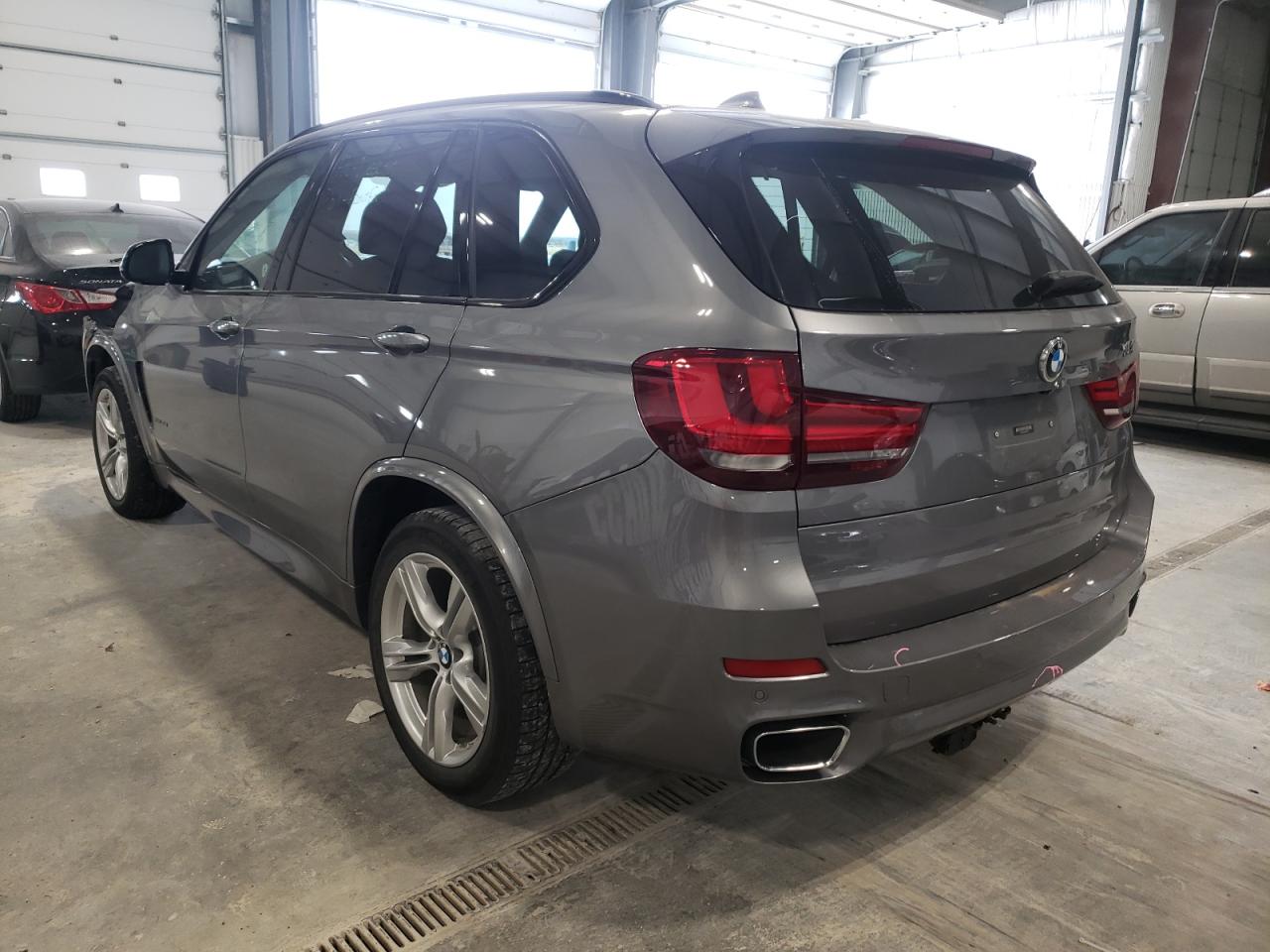 Photo 3 from auction – 2014 BMW X5 XDRIVE3 with VIN 5UXKS4C5XE0J94575