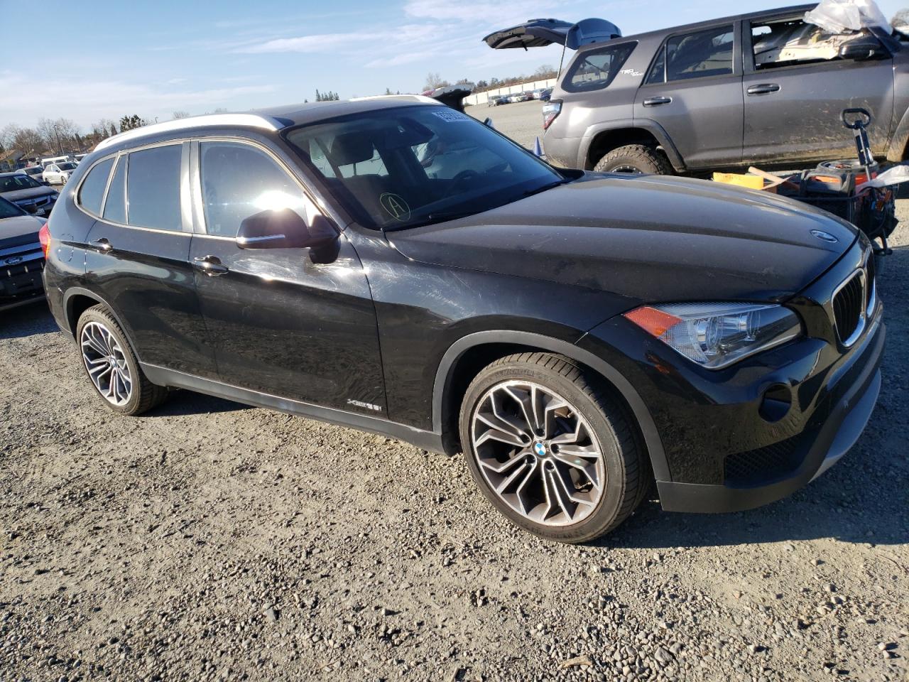 BMW X1 XDRIVE3 2013 with VIN WBAVM5C59DVV91031 - Photo from auction