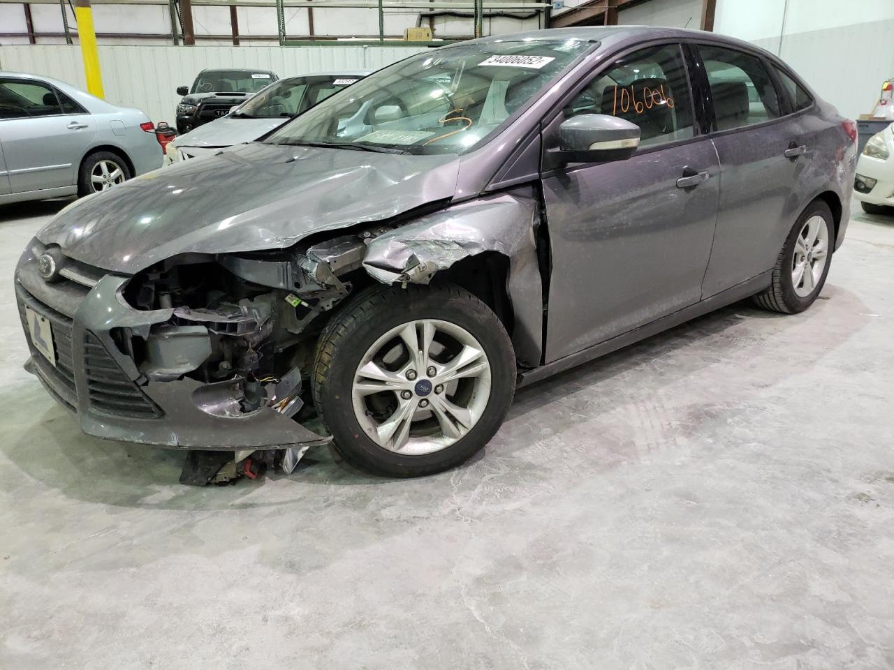 Photo 2 from auction – 2014 FORD FOCUS SE with VIN 1FADP3F21EL193536