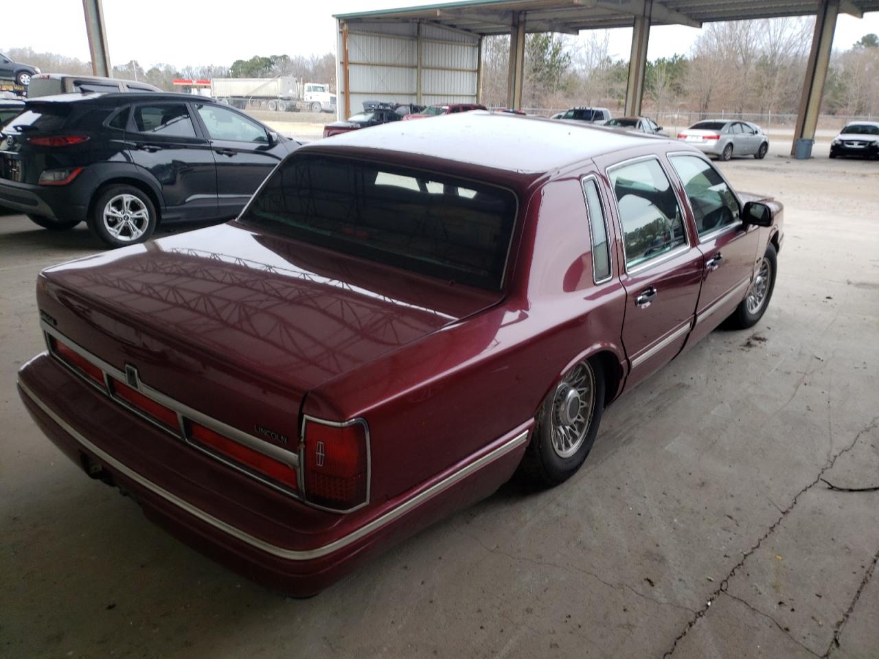 Photo 4 from auction – 1997 LINCOLN TOWN CAR E with VIN 1LNLM81W5VY693851