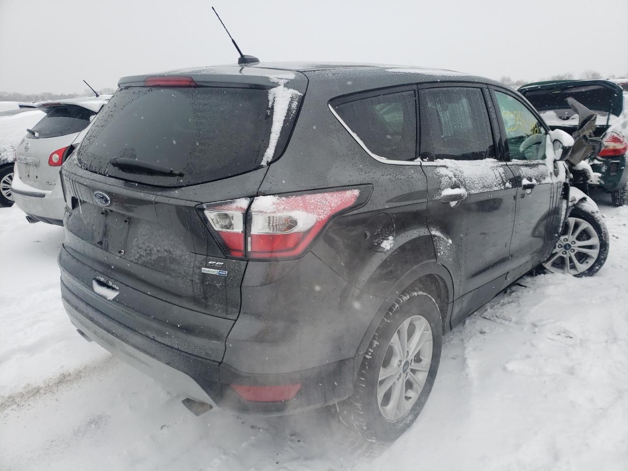 Photo 4 from auction – 2017 FORD ESCAPE SE with VIN 1FMCU9GD8HUA53611