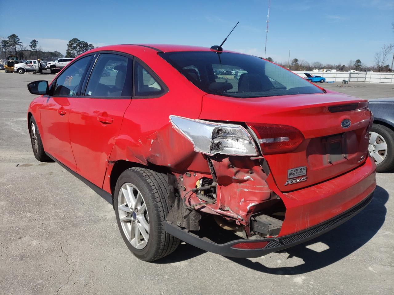 Photo 3 from auction – 2016 FORD FOCUS SE with VIN 1FADP3F24GL276977