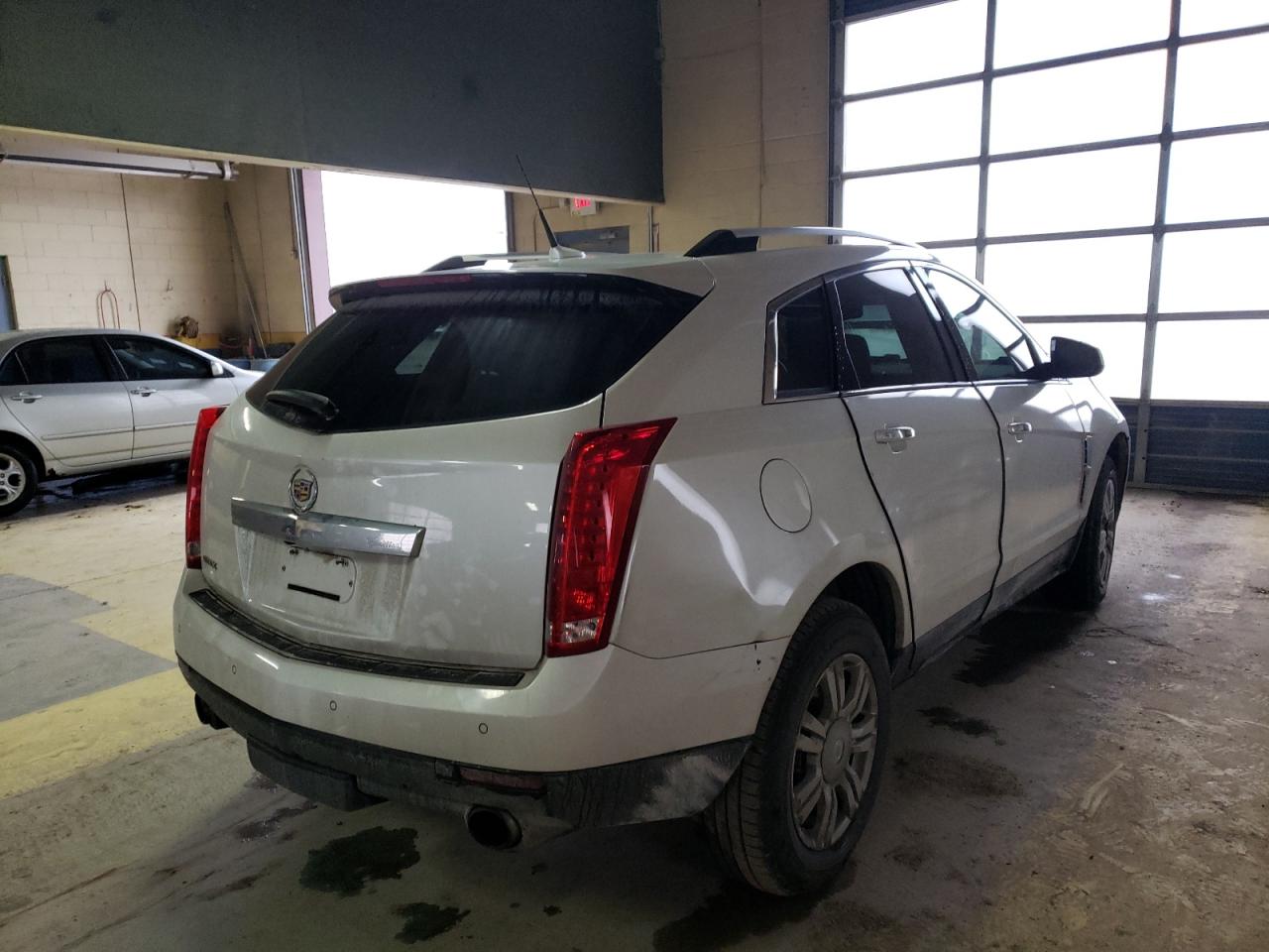 Photo 4 from auction – 2011 CADILLAC SRX LUXURY with VIN 3GYFNAEY4BS542787