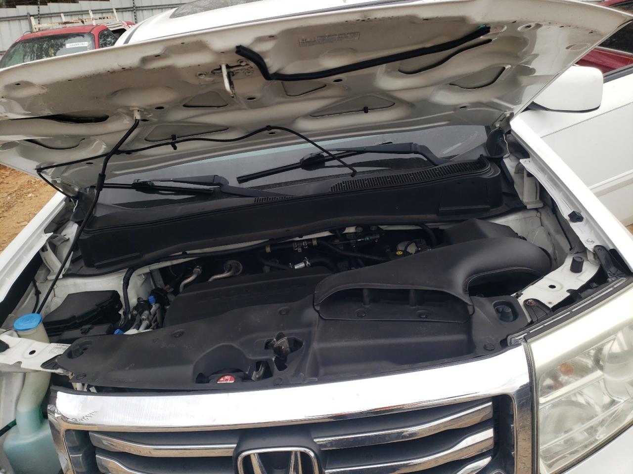 Photo 7 from auction – 2012 HONDA PILOT EXL with VIN 5FNYF3H61CB027029