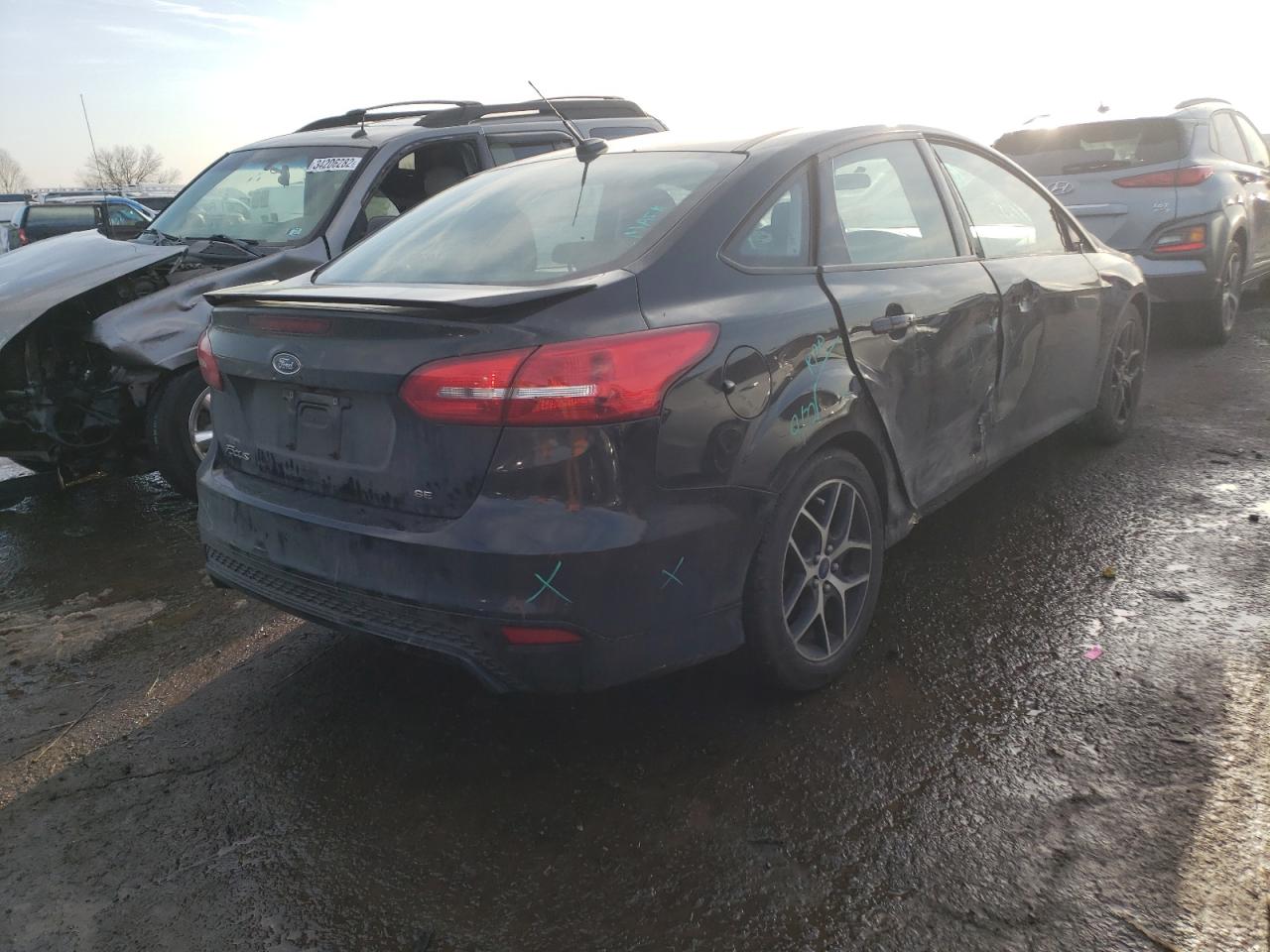 Photo 4 from auction – 2015 FORD FOCUS SE with VIN 1FADP3F25FL252136