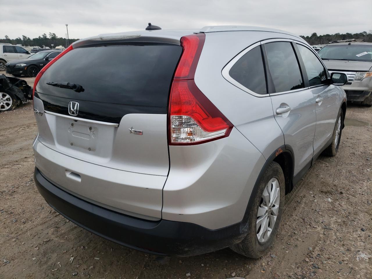 Photo 4 from auction – 2014 HONDA CR-V EXL with VIN 2HKRM3H78EH554363