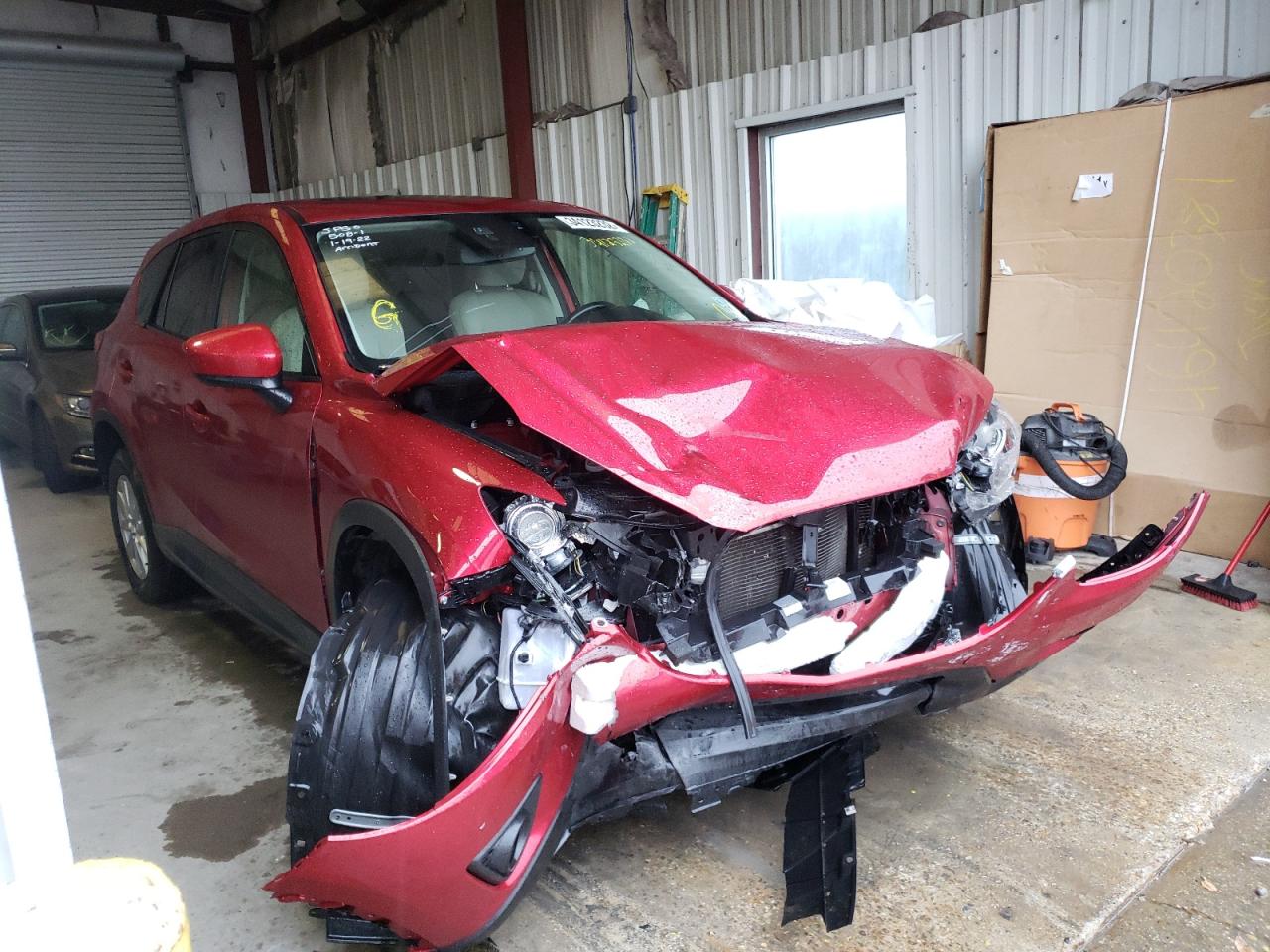 MAZDA CX-5 TOURI 2014 with VIN JM3KE2CY5E0397520 - Photo from auction