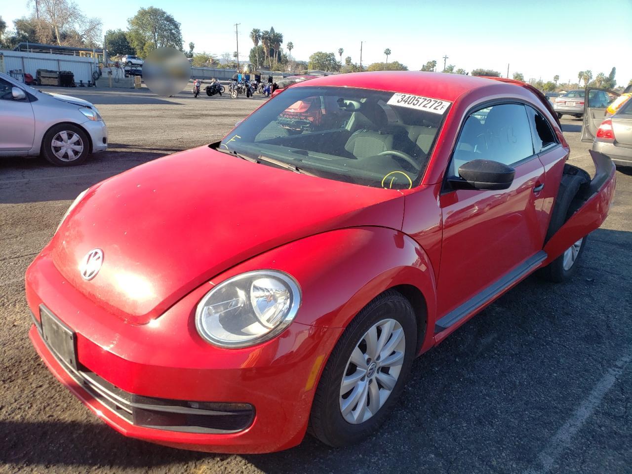 Photo 2 from auction – 2013 VOLKSWAGEN BEETLE with VIN 3VWFP7AT1DM663195