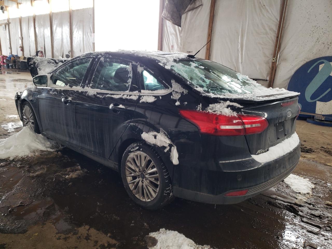 Photo 3 from auction – 2017 FORD FOCUS TITA with VIN 1FADP3J29HL268351