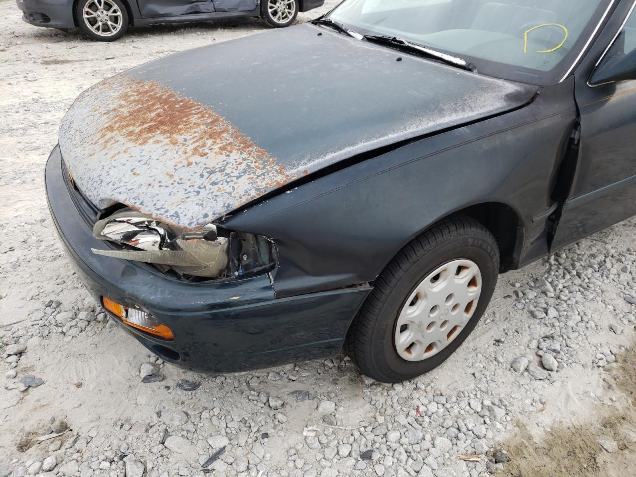 Photo 9 from auction – 1995 TOYOTA CAMRY LE with VIN 4T1SK12E8SU603321
