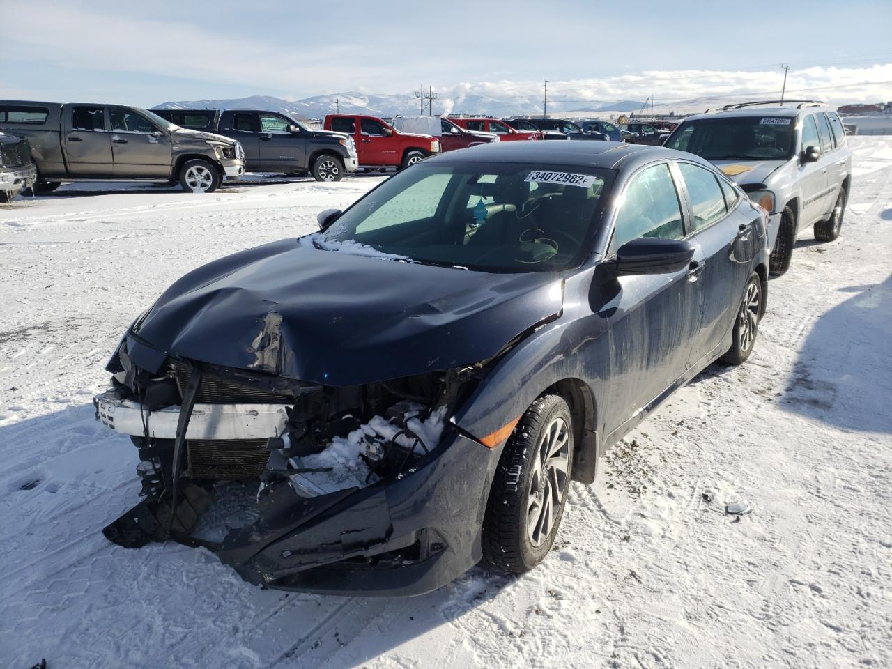 Photo 2 from auction – 2017 HONDA CIVIC EX with VIN 2HGFC2F7XHH567794