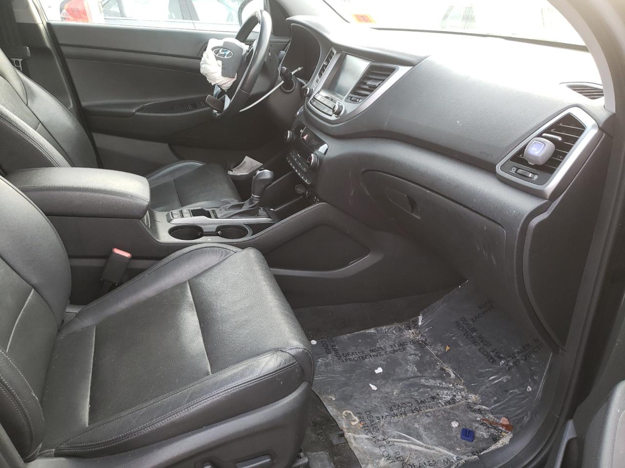 Photo 5 from auction – 2016 HYUNDAI TUCSON LIM with VIN KM8J3CA22GU193912