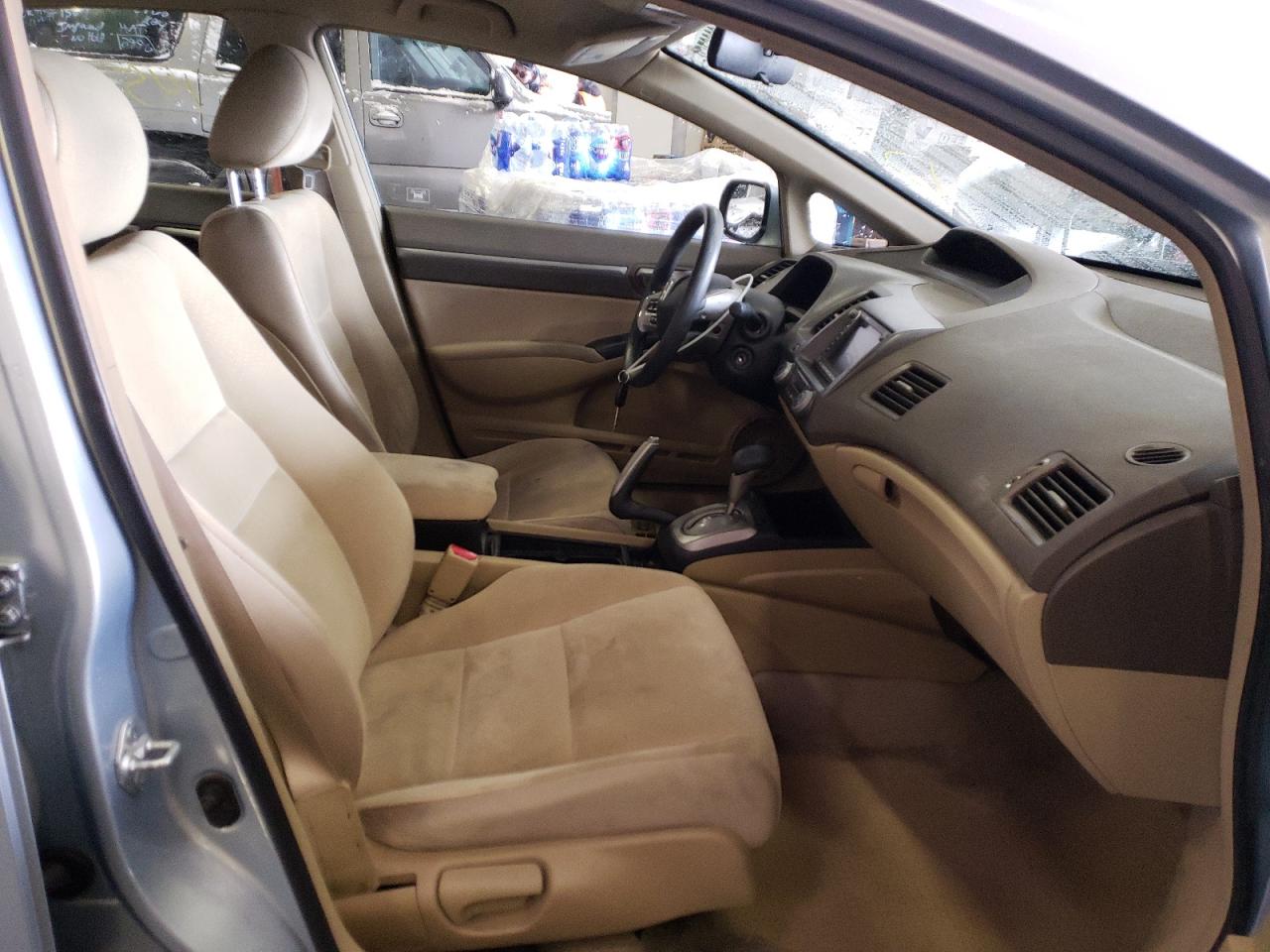 Photo 5 from auction – 2006 HONDA CIVIC HYBR with VIN JHMFA36236S017890