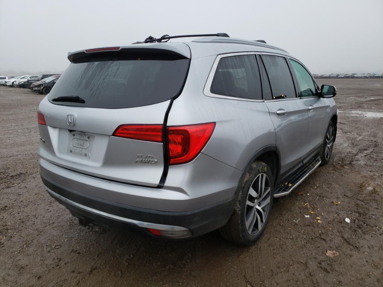 Photo 4 from auction – 2016 HONDA PILOT ELIT with VIN 5FNYF6H00GB078217