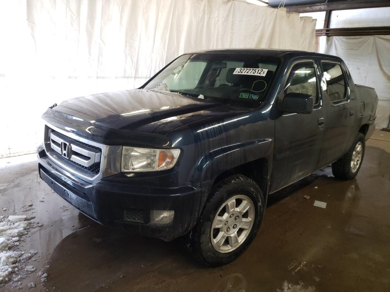 Photo 2 from auction – 2011 HONDA RIDGELINE with VIN 5FPYK1F40BB451230
