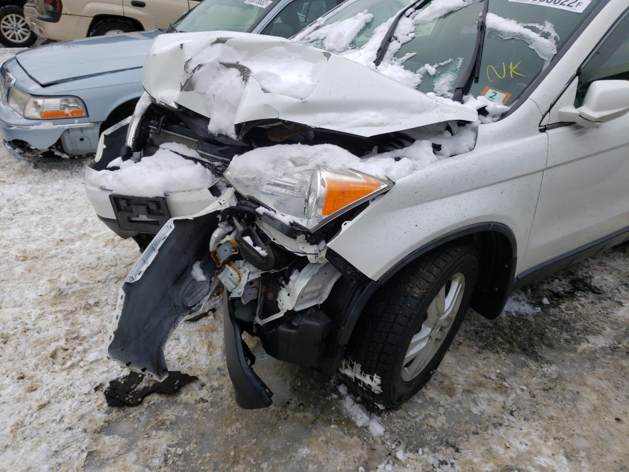 Photo 9 from auction – 2011 HONDA CR-V EXL with VIN JHLRE4H78BC034600