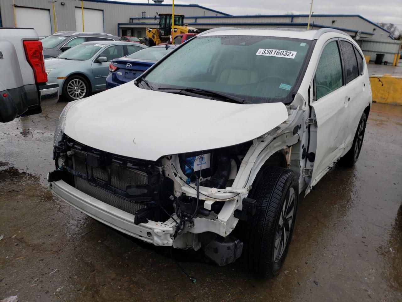 Photo 9 from auction – 2016 HONDA CR-V TOURI with VIN 5J6RM3H95GL018156