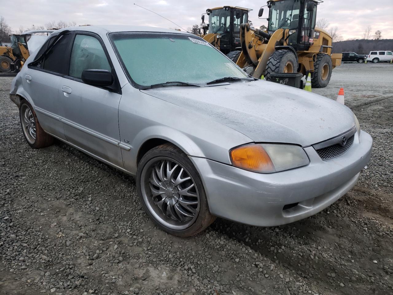 MAZDA PROTEGE DX 2000 with VIN JM1BJ2226Y0253030 - Photo from auction
