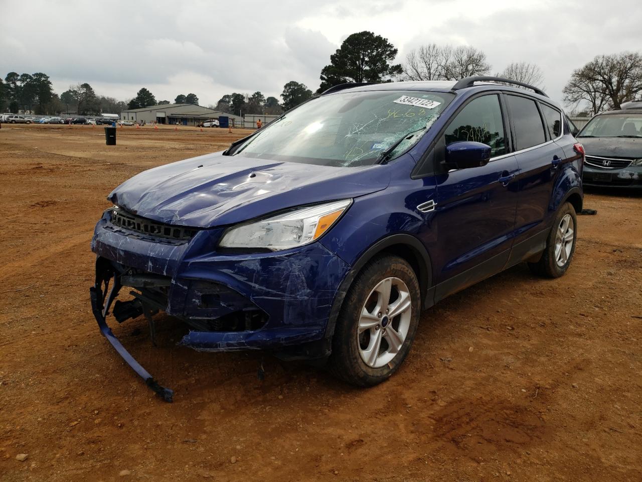 Photo 2 from auction – 2016 FORD ESCAPE SE with VIN 1FMCU0GX1GUB94668