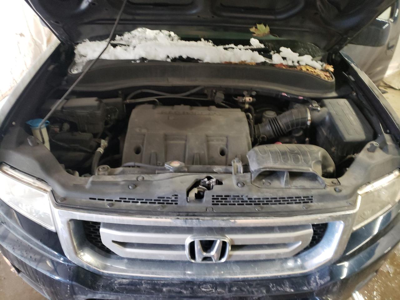Photo 7 from auction – 2011 HONDA RIDGELINE with VIN 5FPYK1F40BB451230