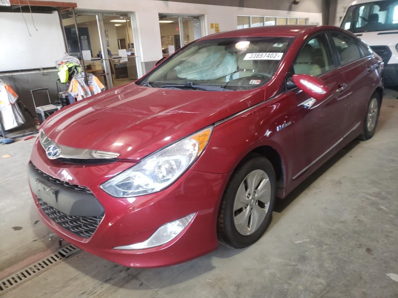 Photo 2 from auction – 2014 HYUNDAI SONATA HYB with VIN KMHEC4A46EA110005