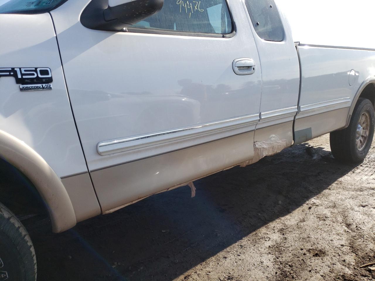 Photo 9 from auction – 1998 FORD F150 with VIN 1FTRX18L7WKC45219