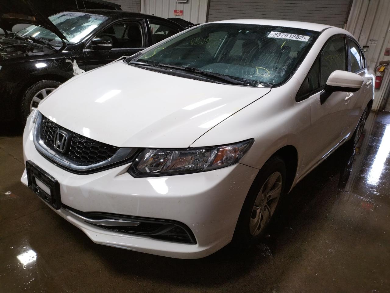 Photo 2 from auction – 2014 HONDA CIVIC LX with VIN 19XFB2F50EE034389