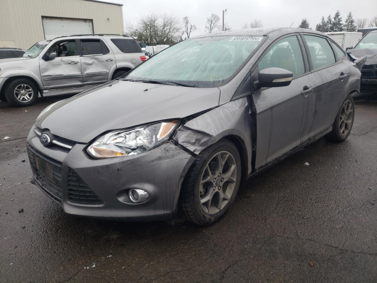 Photo 2 from auction – 2014 FORD FOCUS SE with VIN 1FADP3F27EL119053