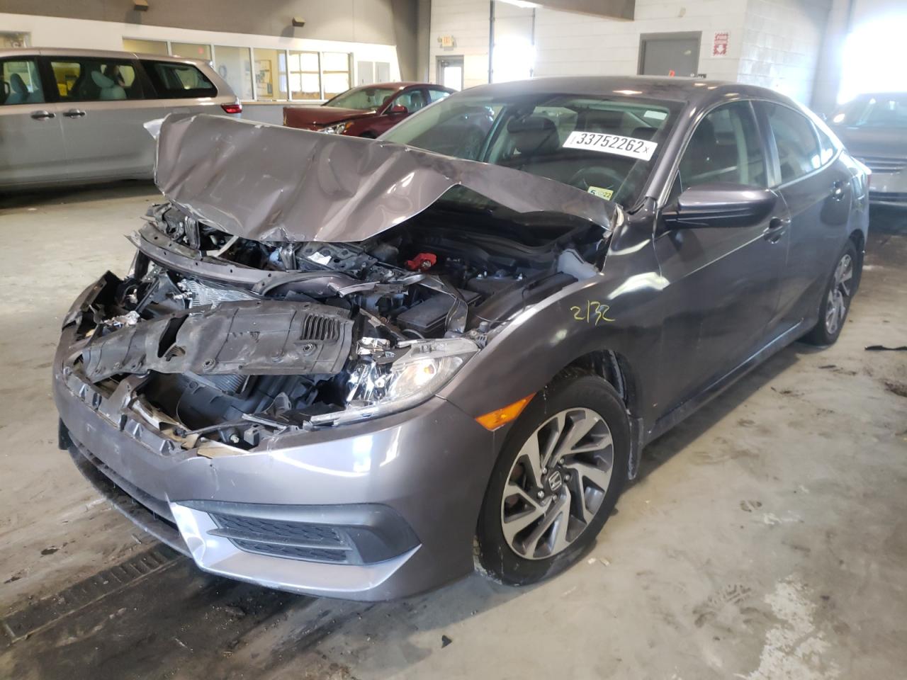 Photo 2 from auction – 2017 HONDA CIVIC EX with VIN 2HGFC2F74HH527260