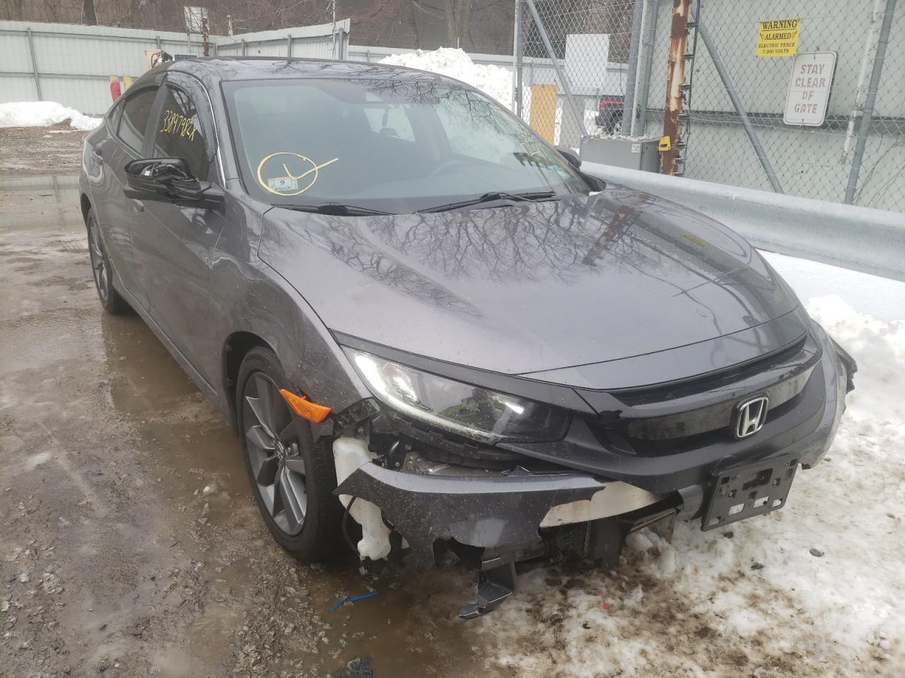 HONDA CIVIC EX 2019 with VIN 19XFC1F30KE202095 - Photo from auction