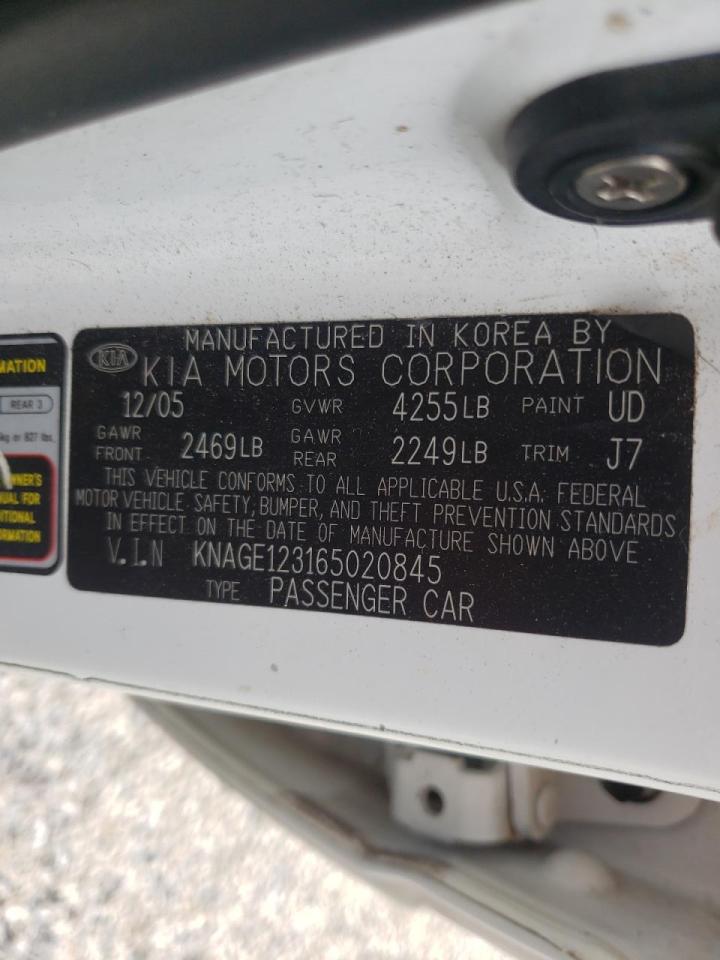 Photo 10 from auction – 2006 KIA OPTIMA LX with VIN KNAGE123165020845