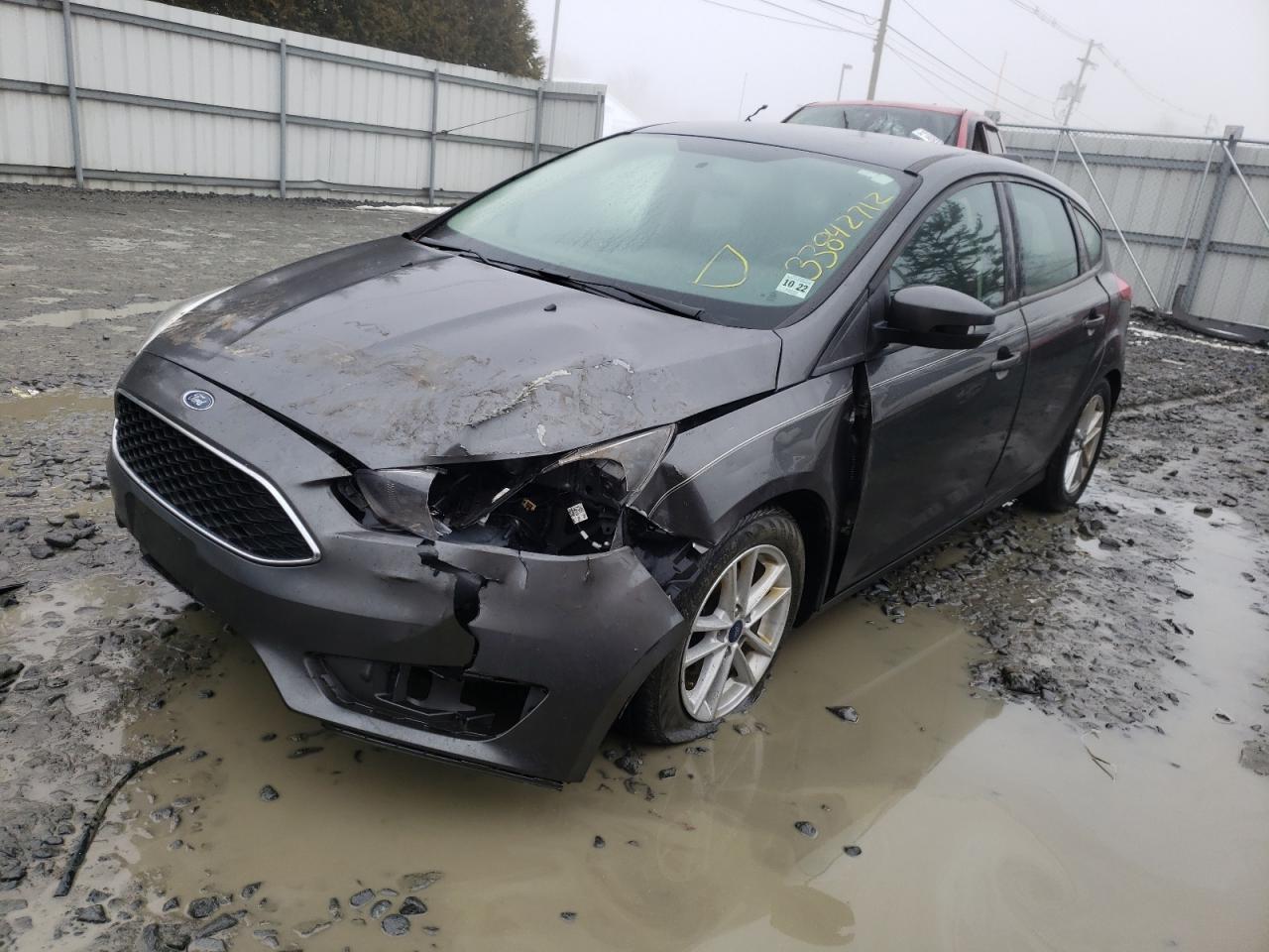 Photo 2 from auction – 2017 FORD FOCUS SE with VIN 1FADP3K28HL335729