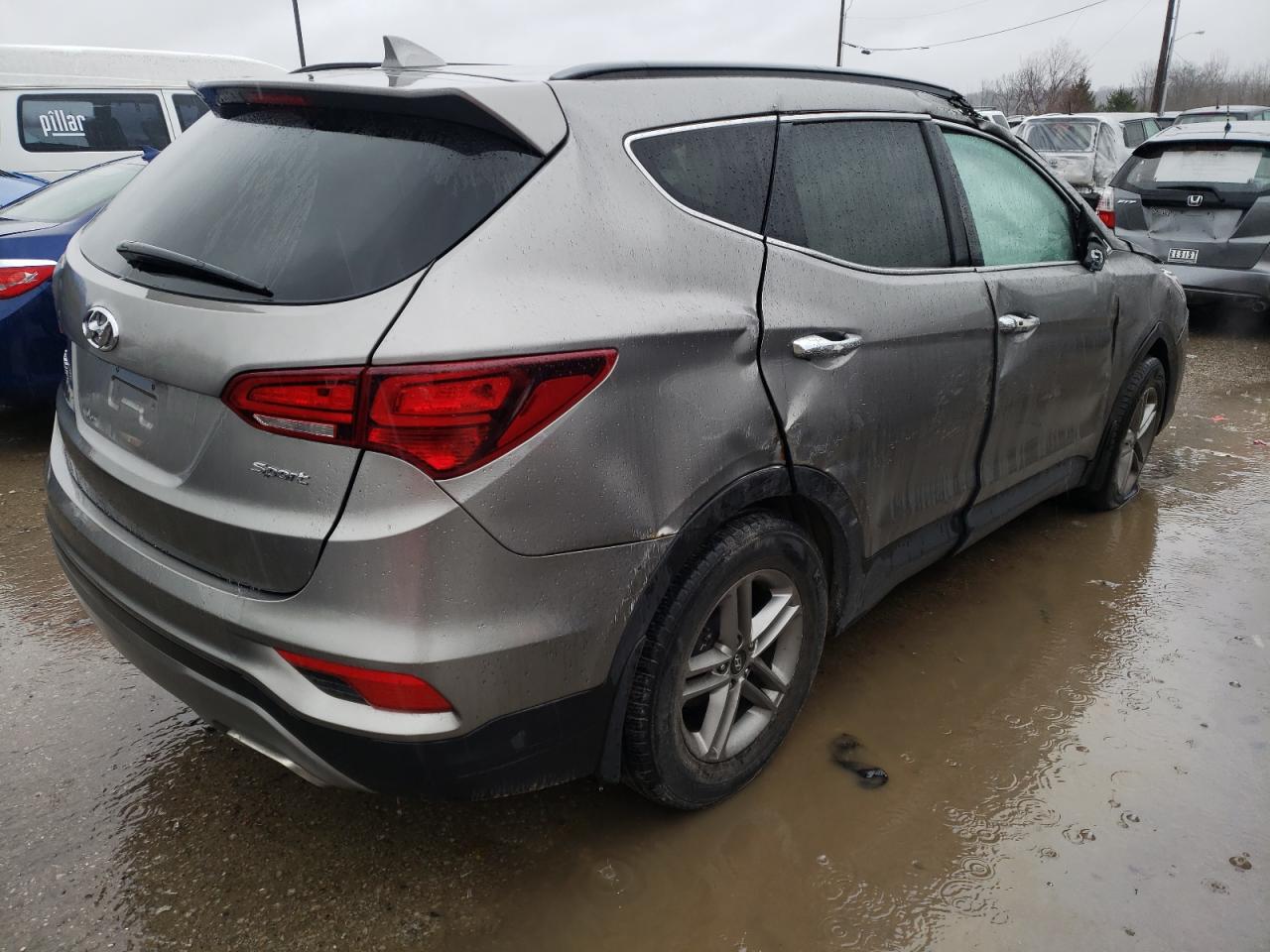 Photo 4 from auction – 2018 HYUNDAI SANTA FE S with VIN 5NMZU3LBXJH098000