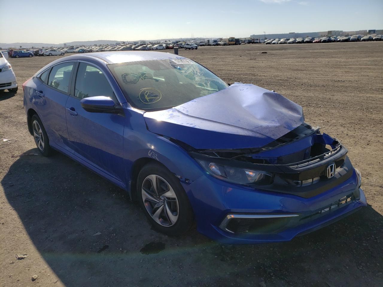 HONDA CIVIC LX 2020 with VIN 19XFC2F65LE211814 - Photo from auction