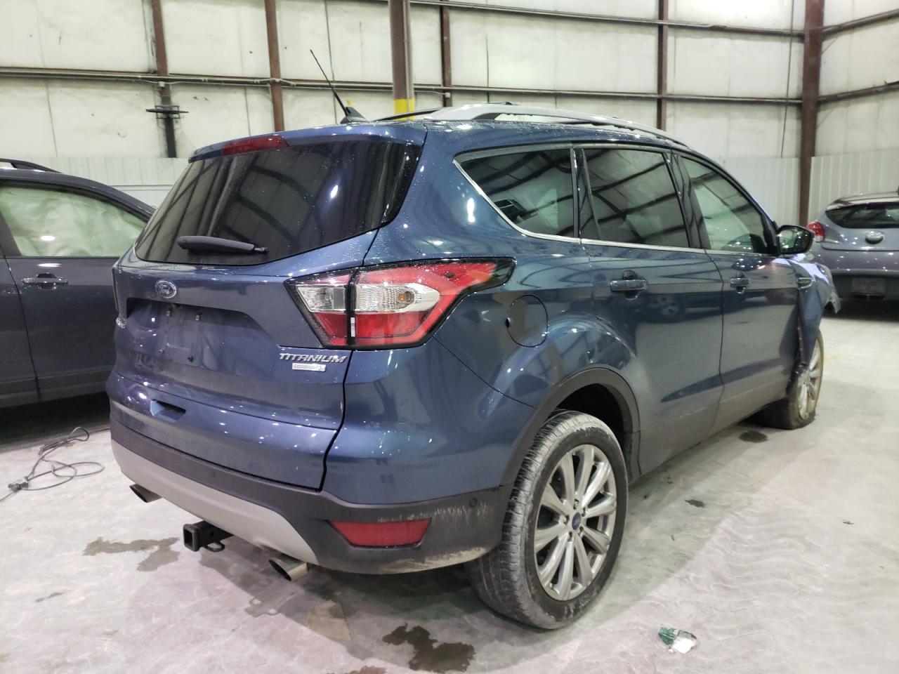 Photo 4 from auction – 2018 FORD ESCAPE TIT with VIN 1FMCU0J91JUC85182