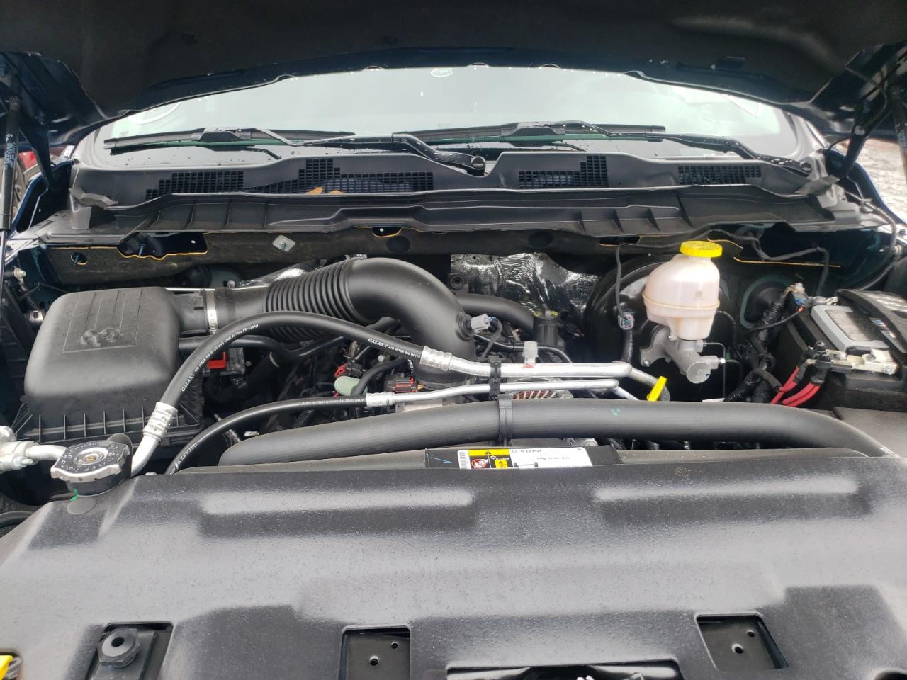 Photo 7 from auction – 2021 RAM 1500 CLASS with VIN 3C6RR6KT4MG707019
