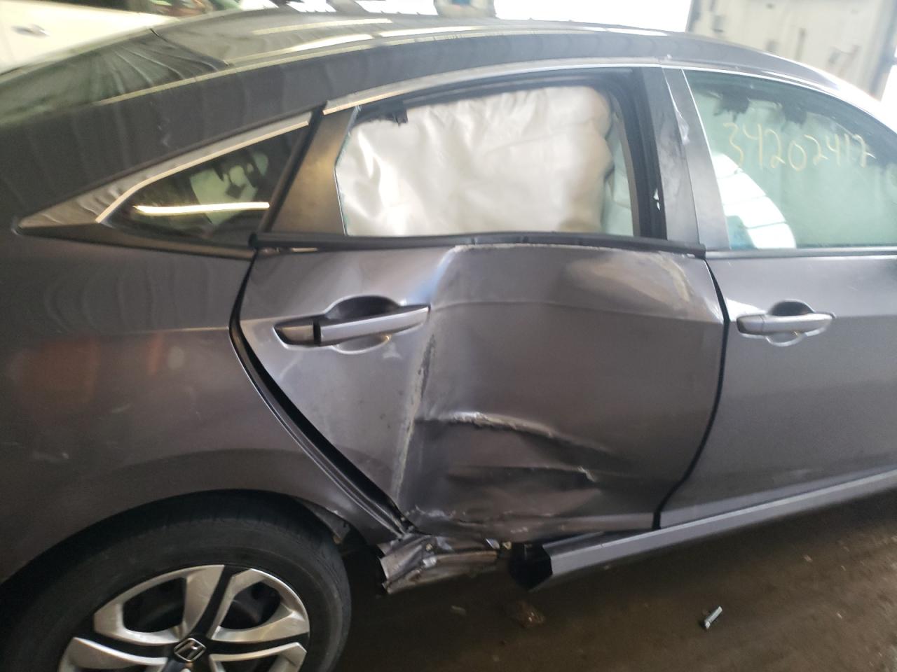 Photo 9 from auction – 2016 HONDA CIVIC LX with VIN 19XFC2F57GE224609