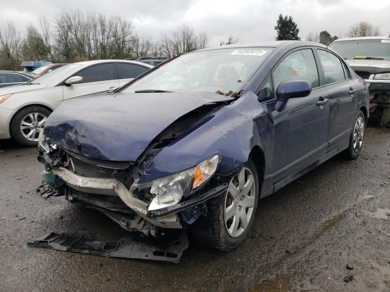 Photo 2 from auction – 2010 HONDA CIVIC LX with VIN 19XFA1F52AE076635