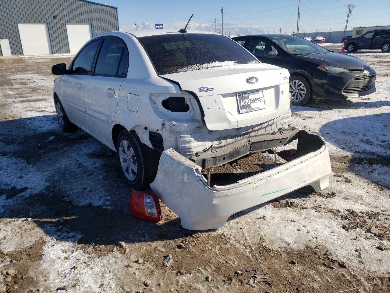 Photo 3 from auction – 2011 KIA RIO BASE with VIN KNADH4A33B6855928