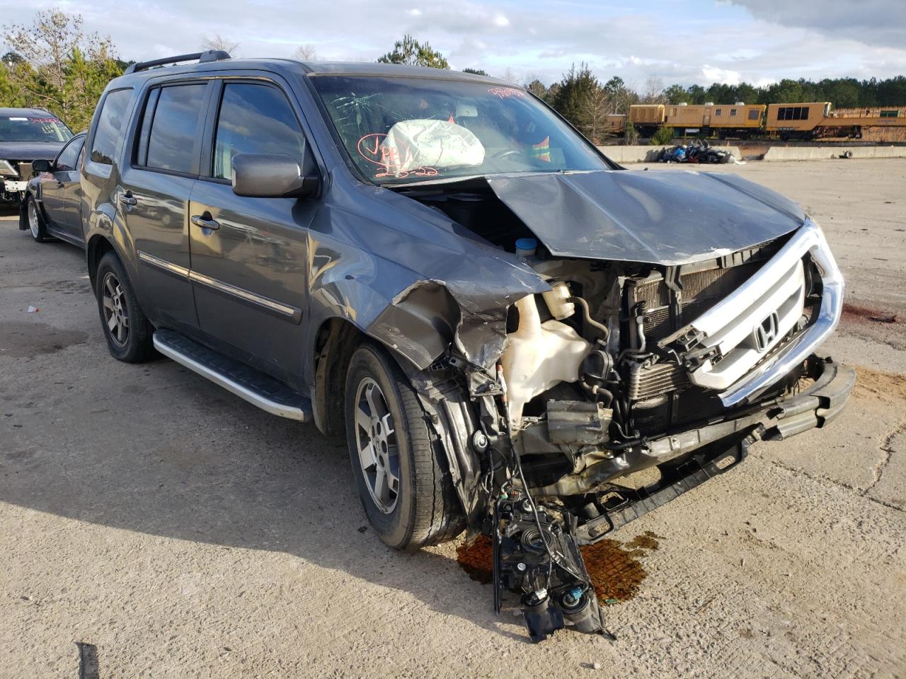 HONDA PILOT TOUR 2011 with VIN 5FNYF3H93BB005381 - Photo from auction