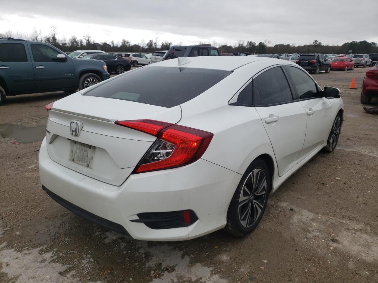 Photo 4 from auction – 2018 HONDA CIVIC EX with VIN JHMFC1F35JX029302