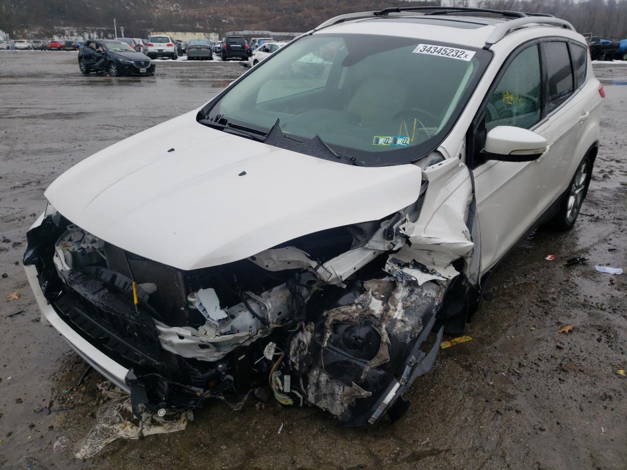 Photo 2 from auction – 2014 FORD ESCAPE TIT with VIN 1FMCU9J95EUB95320