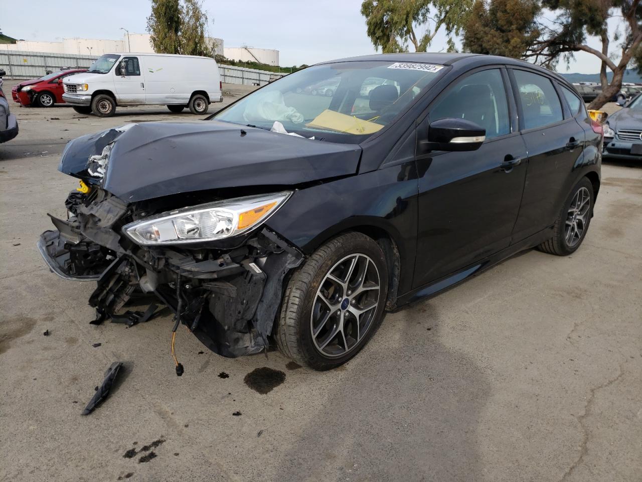 Photo 2 from auction – 2015 FORD FOCUS SE with VIN 1FADP3K25FL315029