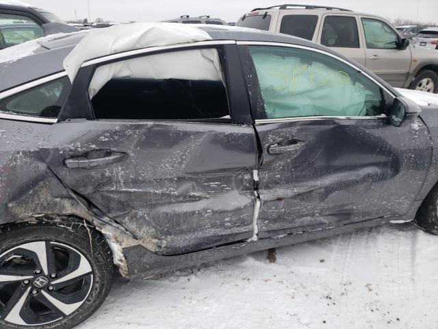 Photo 9 from auction – 2021 HONDA INSIGHT EX with VIN 19XZE4F50ME010768