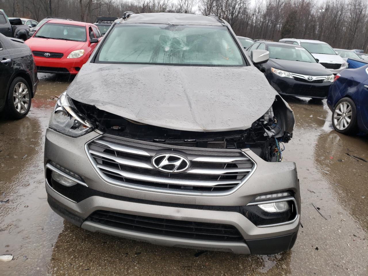 Photo 9 from auction – 2018 HYUNDAI SANTA FE S with VIN 5NMZU3LBXJH098000
