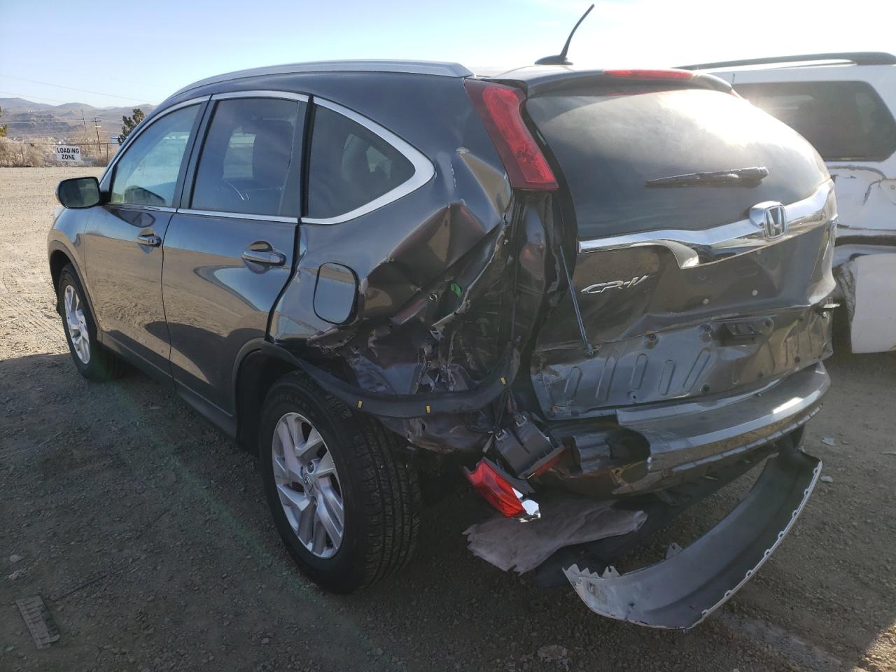 Photo 3 from auction – 2016 HONDA CR-V EXL with VIN 2HKRM4H77GH719599