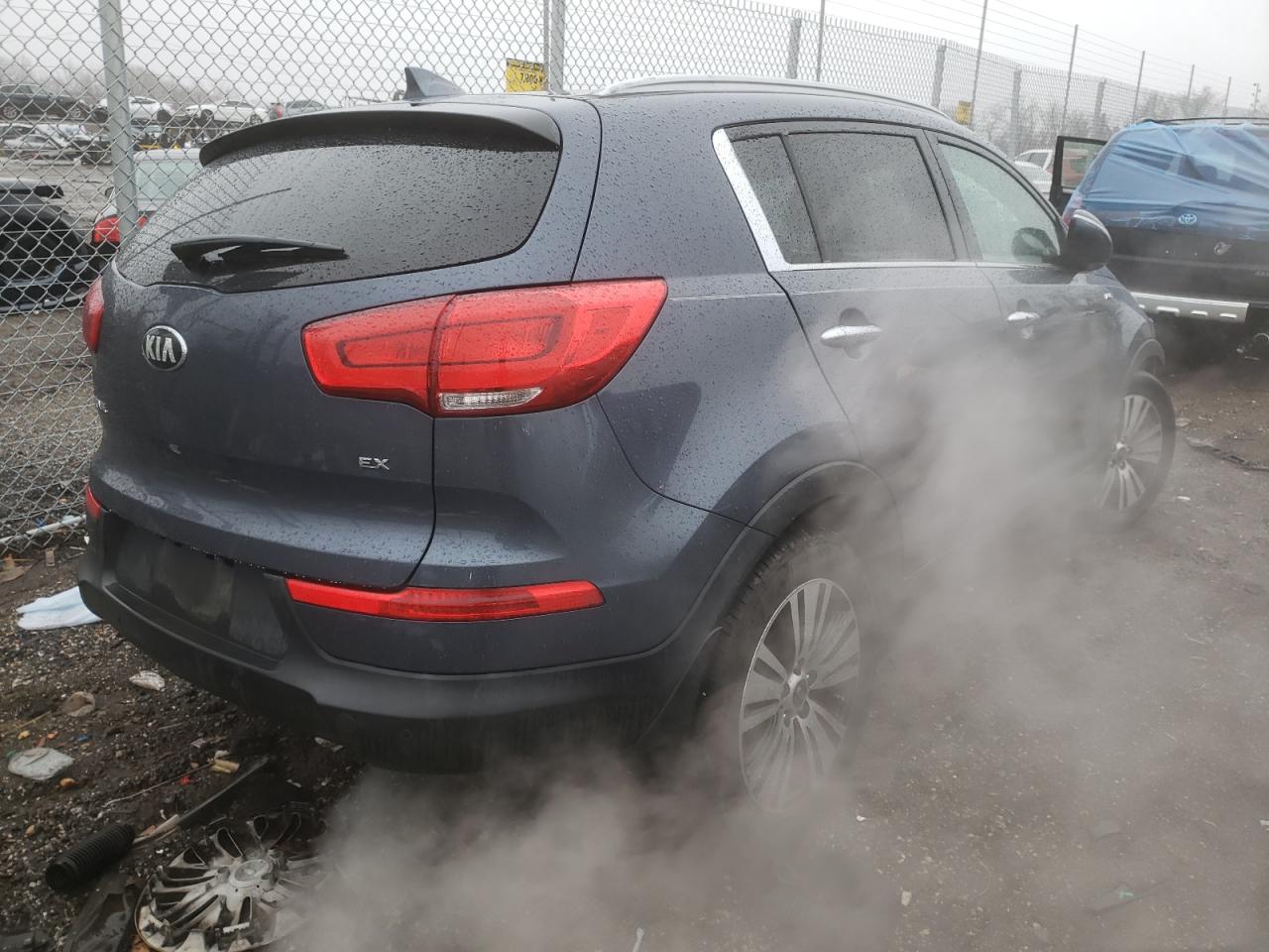 Photo 4 from auction – 2014 KIA SPORTAGE E with VIN KNDPCCAC2E7565591